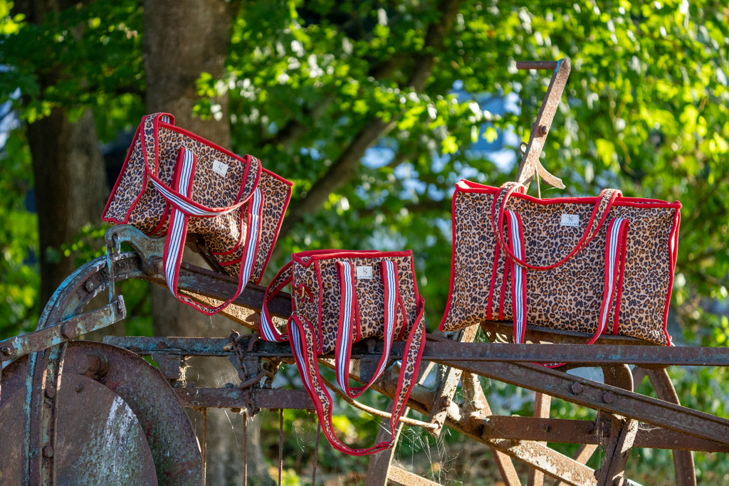 Leopard Print Red Pipe Tote bags